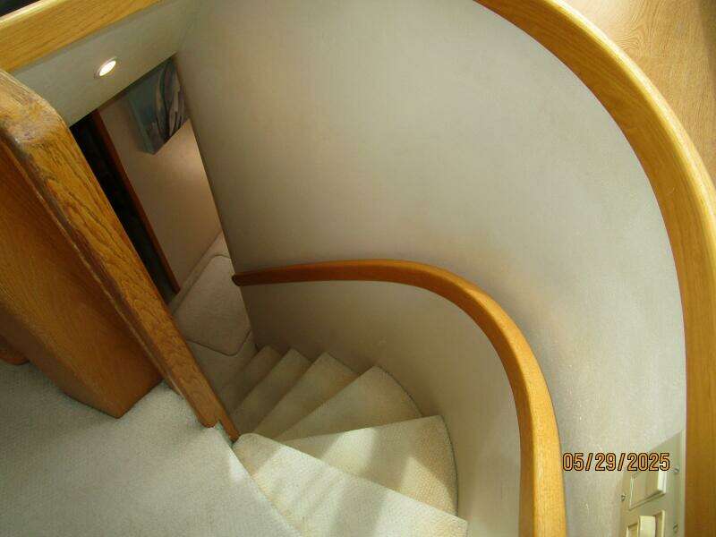 58' West Bay guest companionway stairs