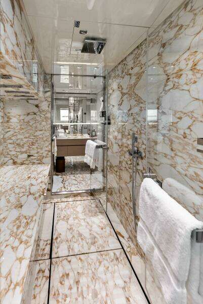 Primary Stateroom Ensuite Shower - between "his" and "hers" vanity and W.C.