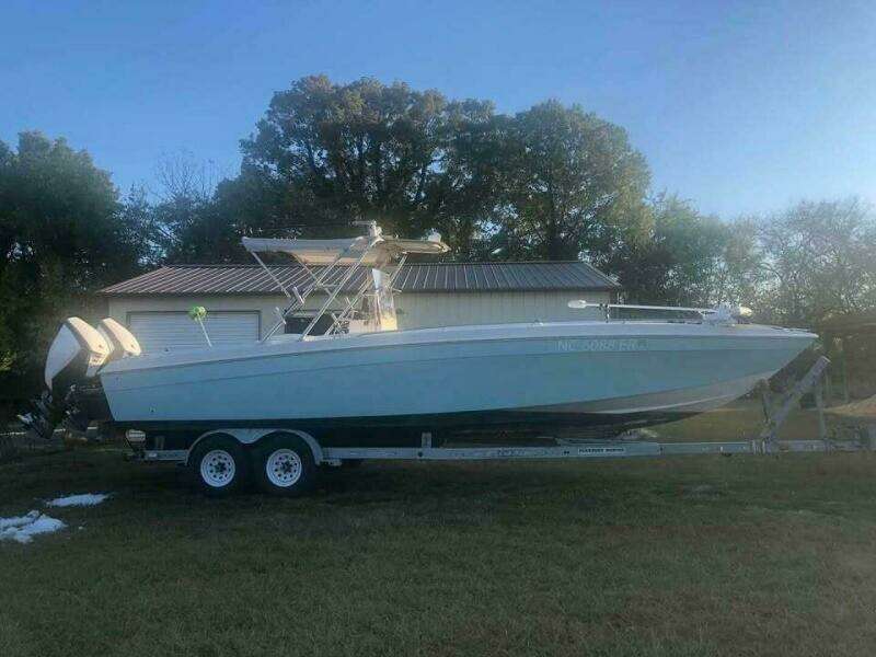 1990 Wellcraft Scarab 30 Cuddy