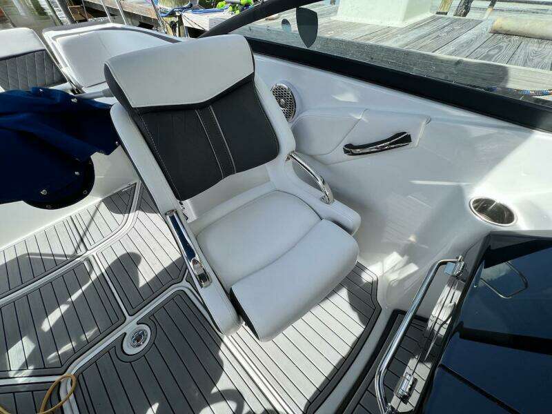 Captain's chair in a 2022 Monterey M-45 boat, featuring sleek design and modern upholstery.