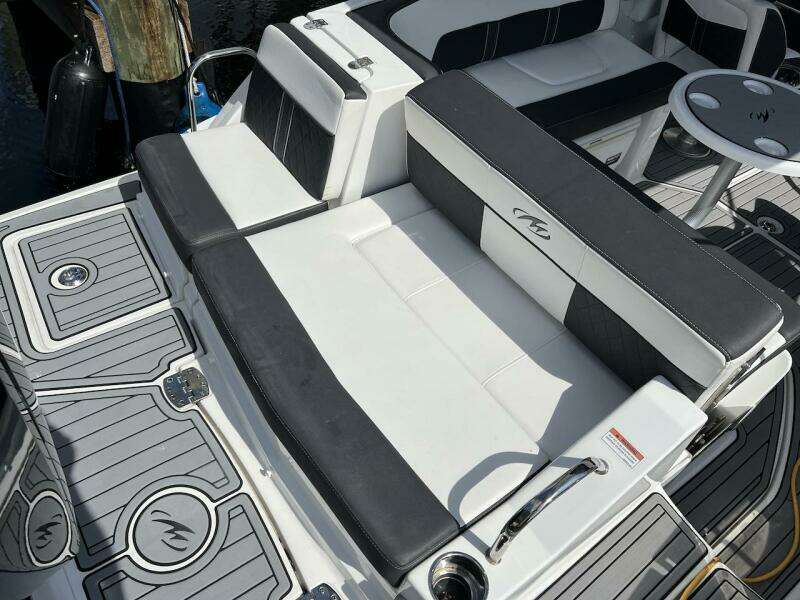 Monterey M-45 2022 boat interior with black and white seating and deck.