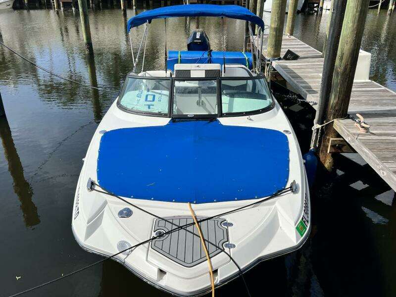 2022 Monterey M-45 boat docked with blue cover and canopy.