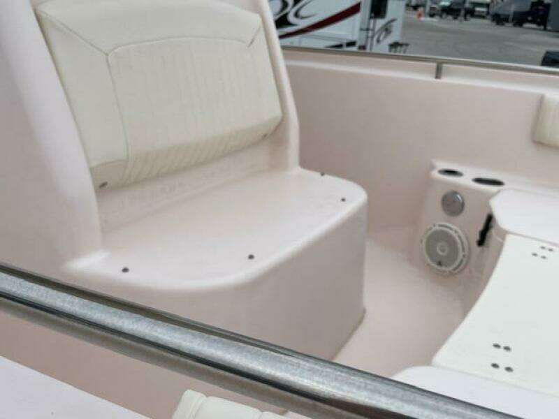 2014 Grady-White Fisherman 257 boat interior with seating and speaker.