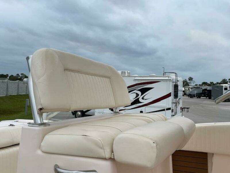 2014 Grady-White Fisherman 257 boat seat with RVs in the background.