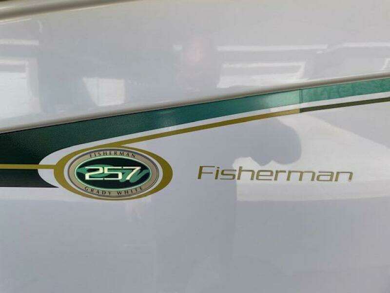 2014 Grady-White Fisherman 257 boat logo and model name on hull.