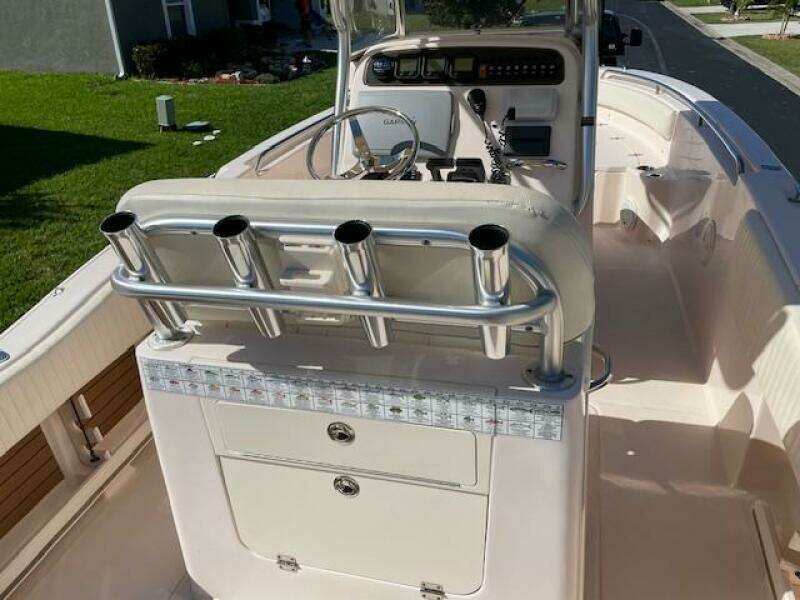 2014 Grady-White Fisherman 257 boat interior with rod holders and console.