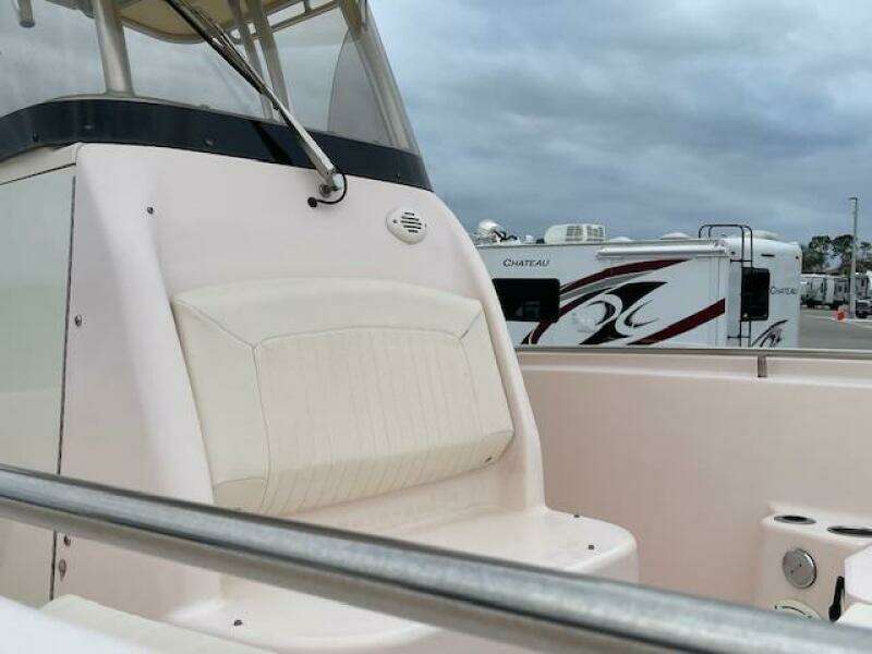 2014 Grady-White Fisherman 257 boat interior with seating and railing.