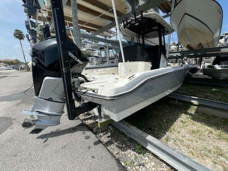2023 Boston Whaler 250 Dauntless boat on trailer, outdoor storage.
