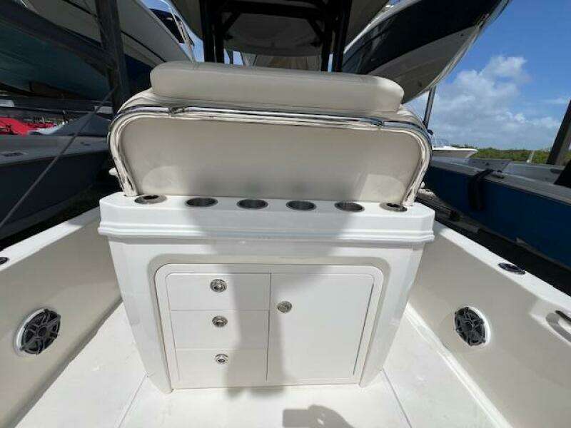 2023 Boston Whaler 250 Dauntless boat interior with storage and seating.