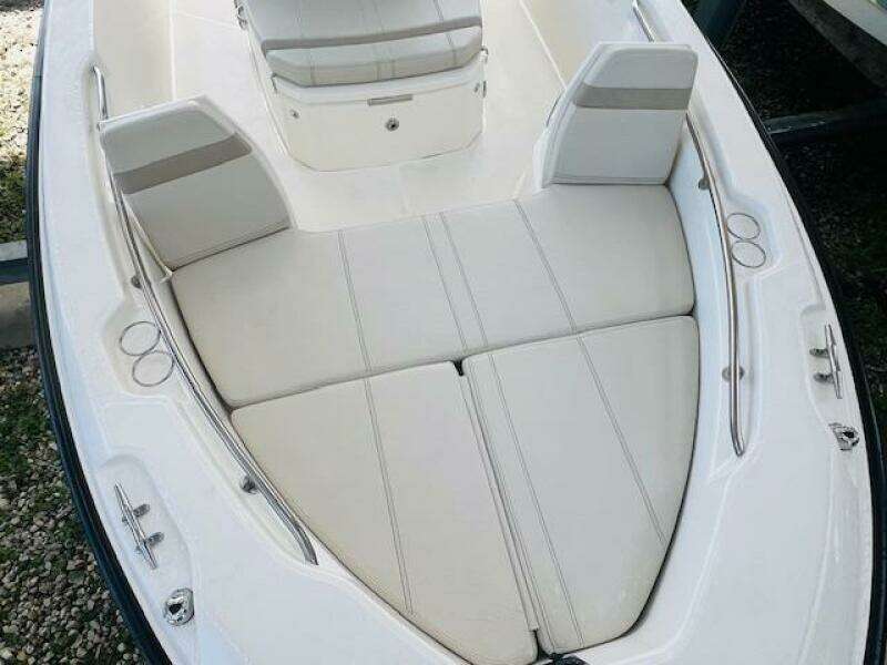 2023 Boston Whaler 250 Dauntless boat interior with cushioned seating.