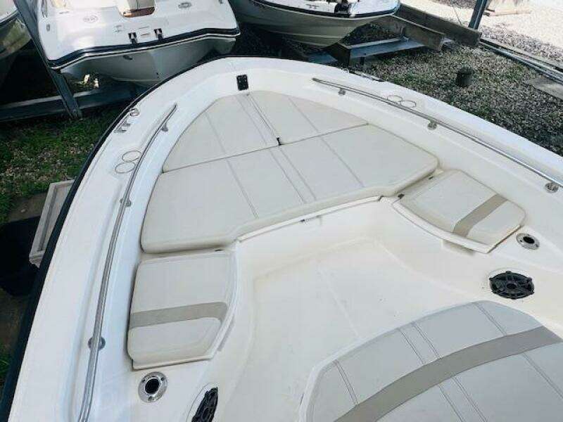 2023 Boston Whaler 250 Dauntless boat interior with cushioned seating.