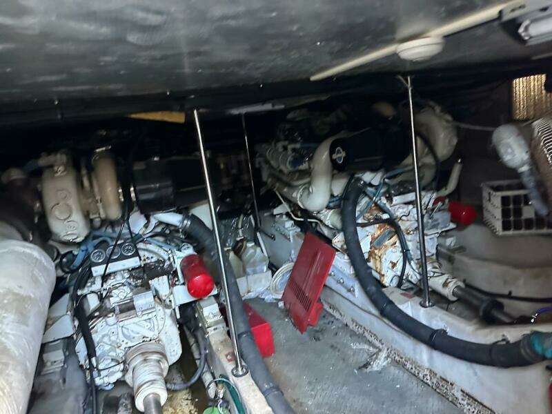 Engine room of a 1997 Sea Ray 550 Sedan Bridge yacht showing twin engines.