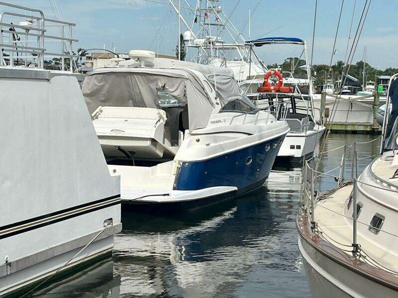 2003 Regal Commodore 3860 yacht docked at a marina.