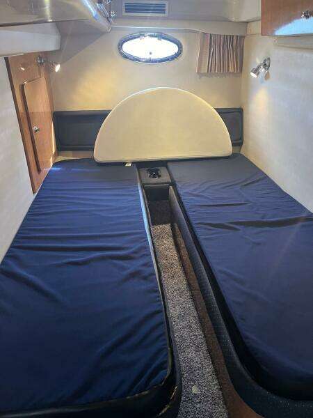 2003 Regal Commodore 3860 cabin interior with twin beds.