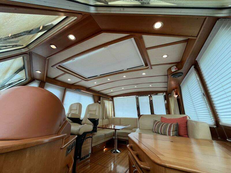 Luxurious interior of 2013 Sabre 48 Salon Express yacht with elegant wood finish.