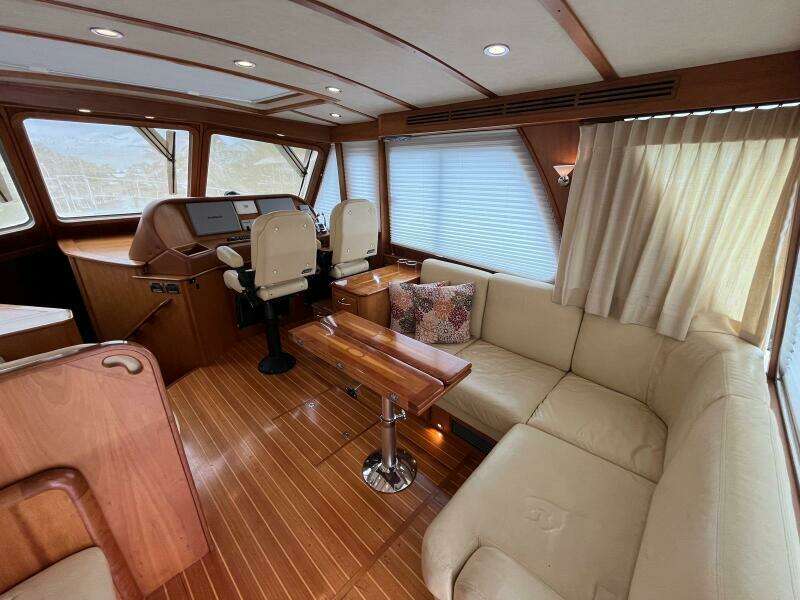 Interior of 2013 Sabre 48 Salon Express yacht with elegant seating and helm.