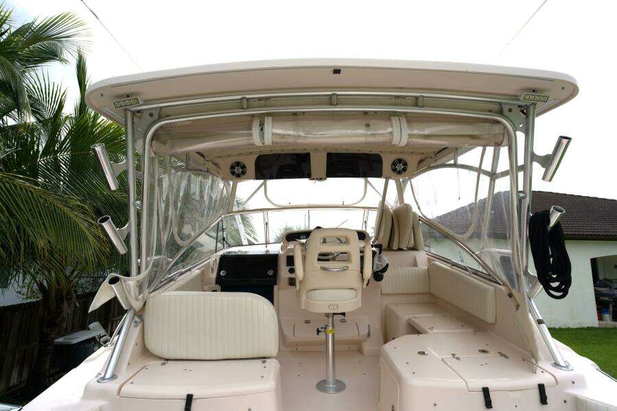 2007 Grady-White Express 330 boat interior with seating and helm station.