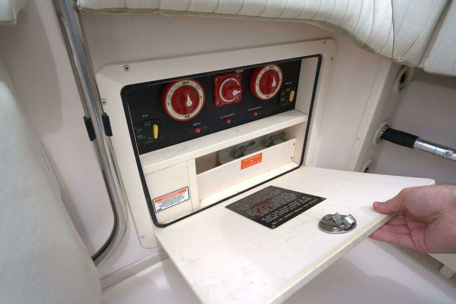 2007 Grady-White Express 330 control panel with switches and dials.