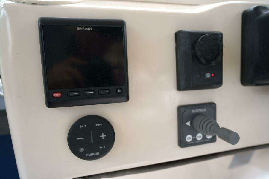 2007 Grady-White Express 330 dashboard with Garmin display and control panel.