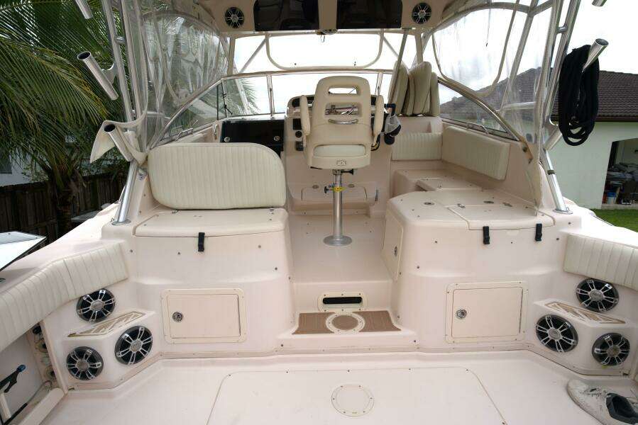 2007 Grady-White Express 330 boat interior with seating and helm station.