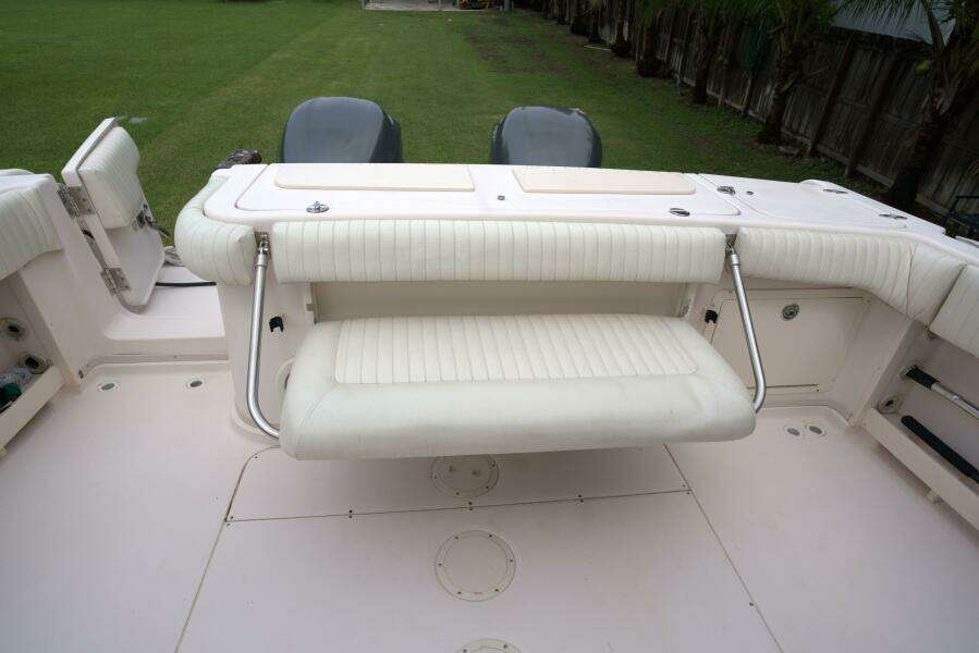 2007 Grady-White Express 330 boat with foldable seating and dual engines.