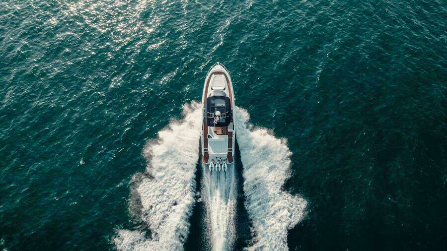 Aerial view of 2024 Oryx 379 boat cruising on open water.