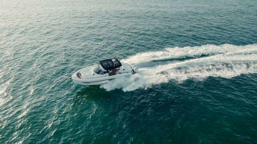 2024 Oryx 379 boat cruising on open water.