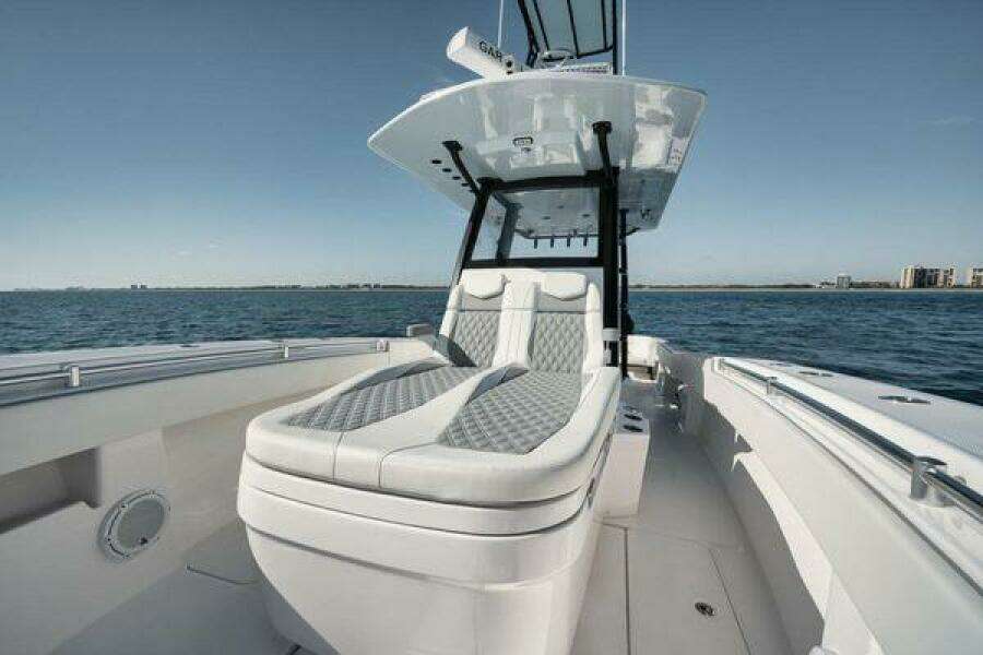 2022 Invincible 36 Open Fisherman boat with sleek seating on open water.