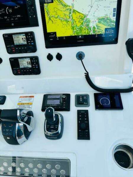 Control panel of 2022 Invincible 36 Open Fisherman with navigation screens and controls.