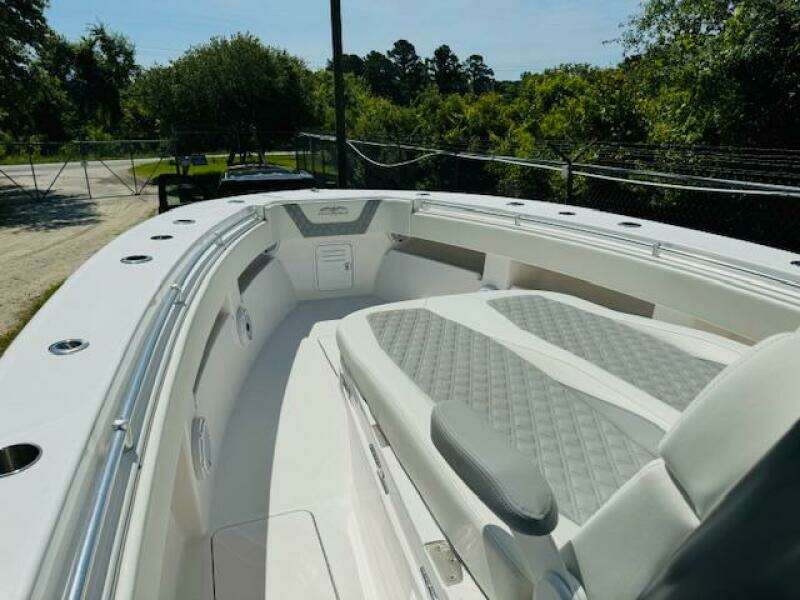 2022 Invincible 36 Open Fisherman boat with spacious seating and sleek design.