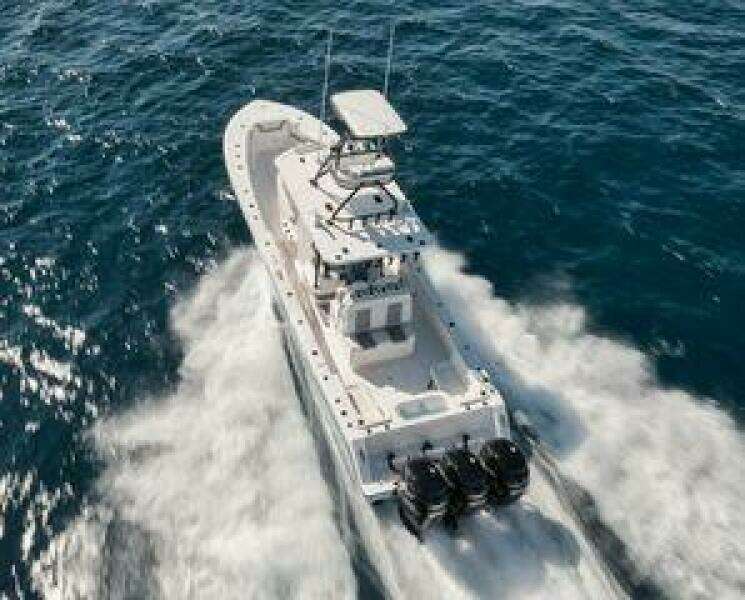 2022 Invincible 36 Open Fisherman boat cruising on open water.