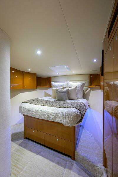 Luxurious bedroom in 2004 Viking 65 Enclosed Bridge w/Tower yacht.