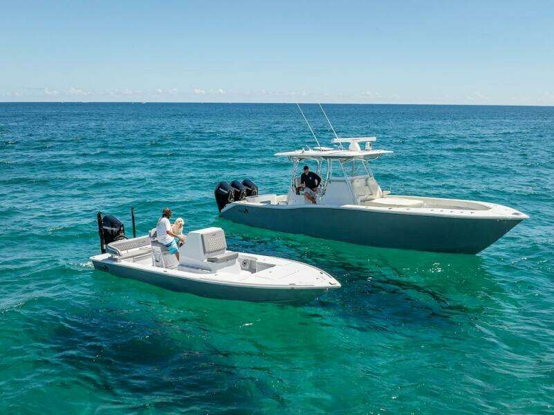2025 Billfish 39 Center Console with Tower on clear ocean waters.