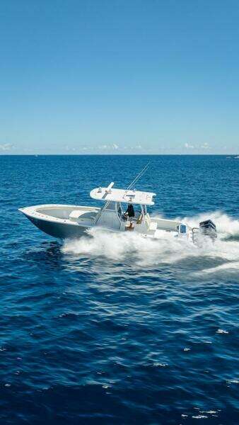 2025 Billfish 39 Center Console boat cruising on open ocean.