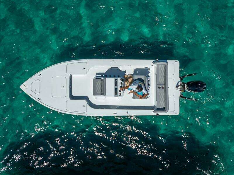 Aerial view of 2025 Billfish 39 Center Console boat on clear turquoise water.