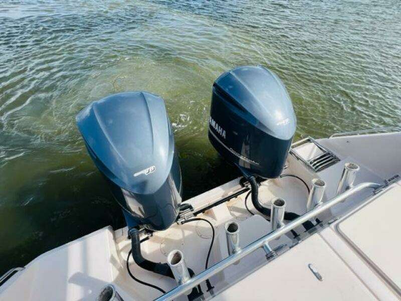 2014 Grady-White Freedom 335 with twin Yamaha outboard engines on water.