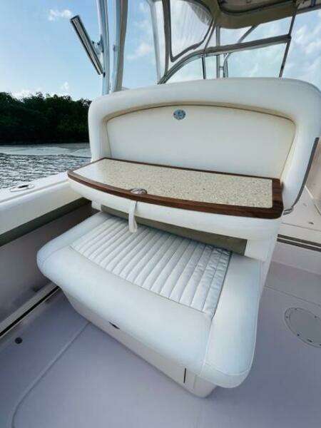 2014 Grady-White Freedom 335 boat interior seating with foldable table.