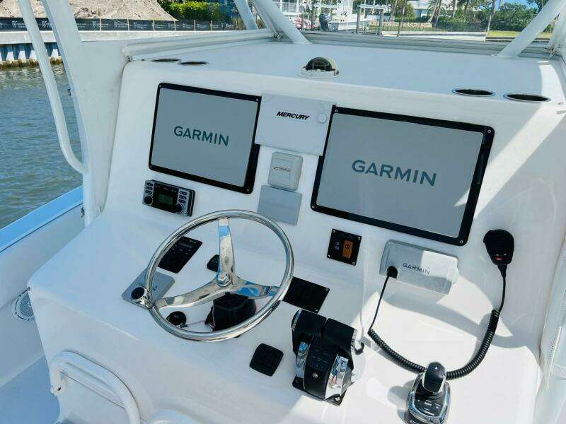 2015 Billfish 39 Custom CC boat helm with dual Garmin displays and Mercury controls.