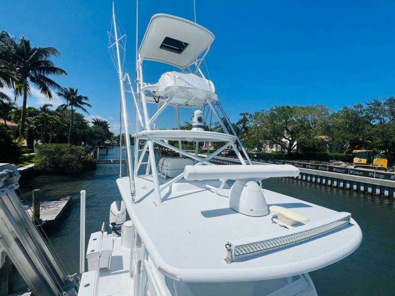 2015 Billfish 39 Custom CC boat docked in a sunny marina.