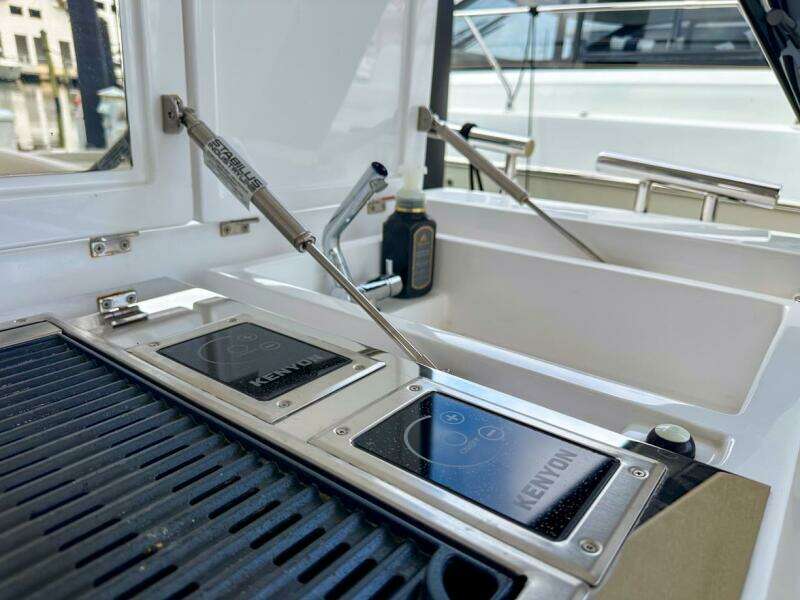 Outdoor kitchen on 2023 Azimut Verve 47 yacht with Kenyon grill.