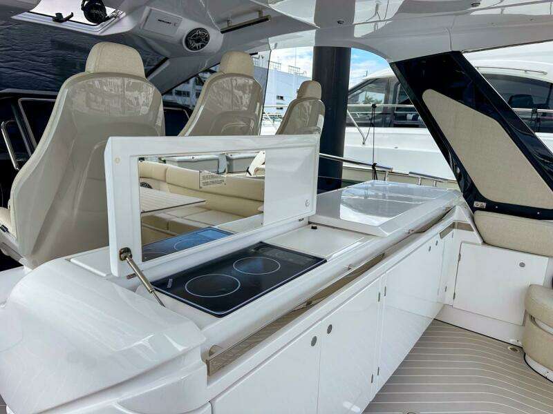 2023 Azimut Verve 47 yacht interior with modern kitchen and seating area.