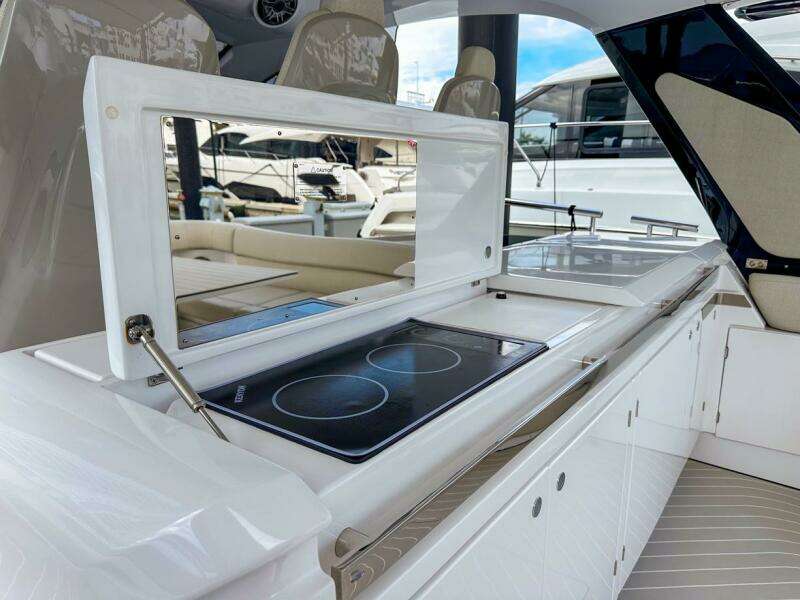 2023 Azimut Verve 47 yacht kitchen with modern stovetop and sleek design.