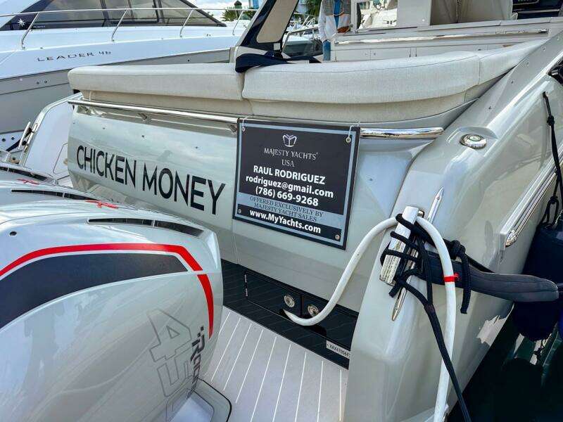 Azimut Verve 47 yacht, 2023 model, named "Chicken Money" with contact details displayed.