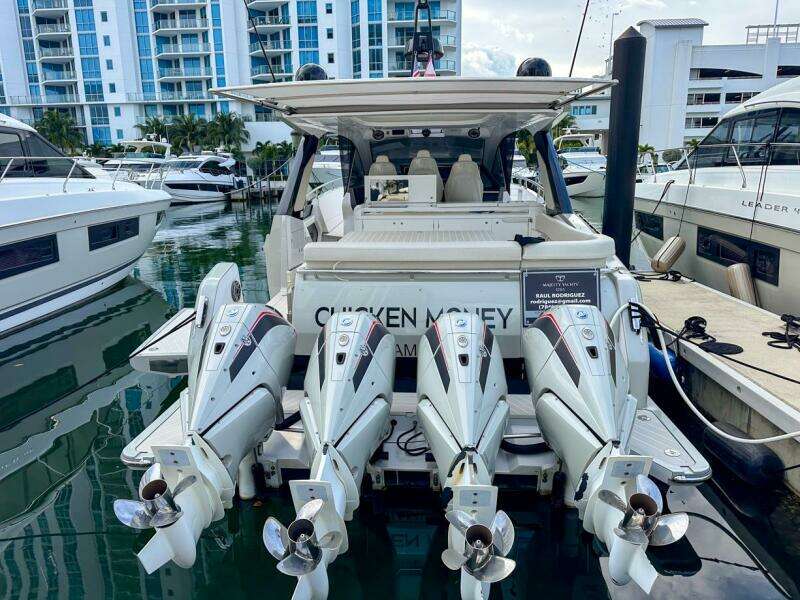 2023 Azimut Verve 47 yacht docked with four powerful outboard engines.