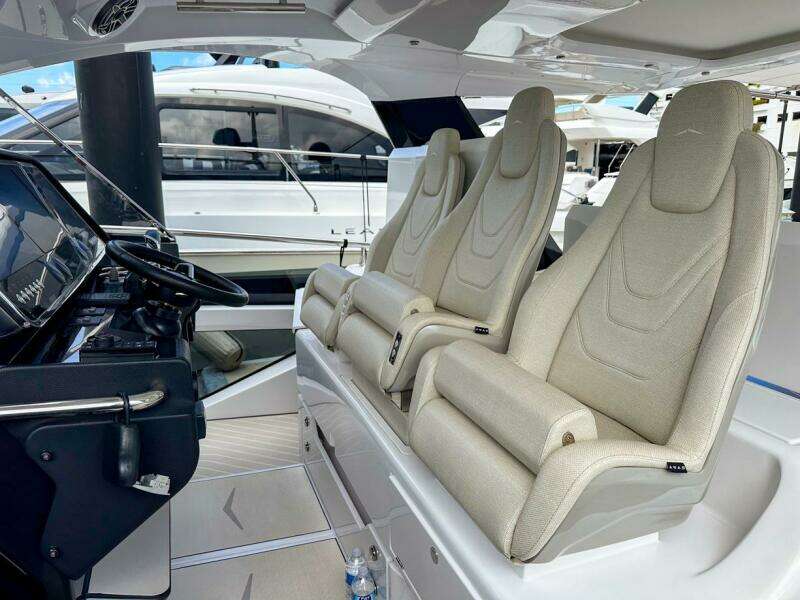 2023 Azimut Verve 47 interior with luxurious seating and modern helm controls.
