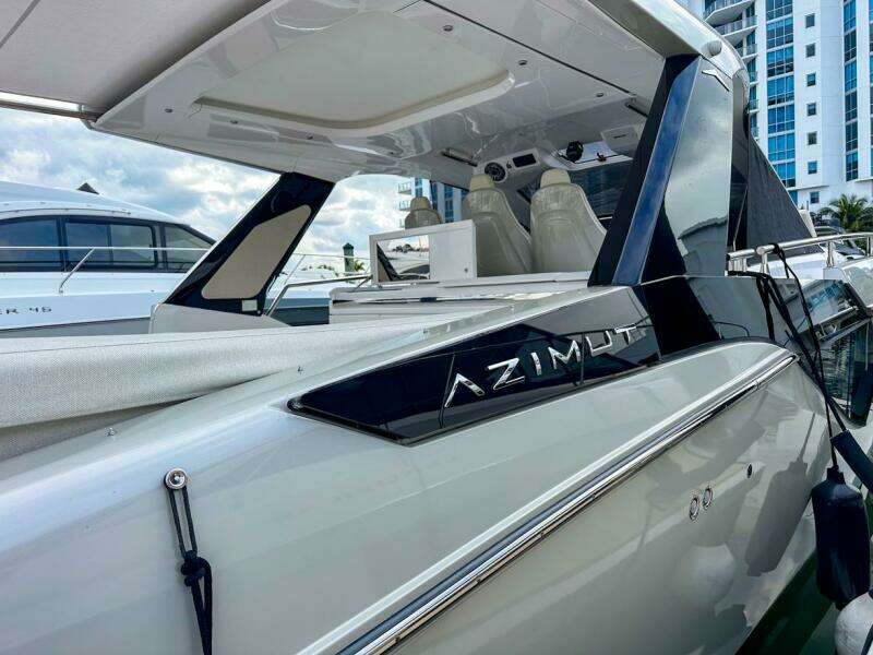 2023 Azimut Verve 47 luxury yacht docked, showcasing sleek design and modern features.