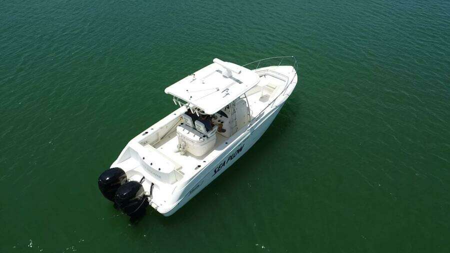 2008 Boston Whaler 320 Outrage boat on open water.