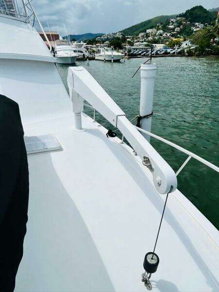 1988 Bertram 54' yacht deck with scenic marina view.