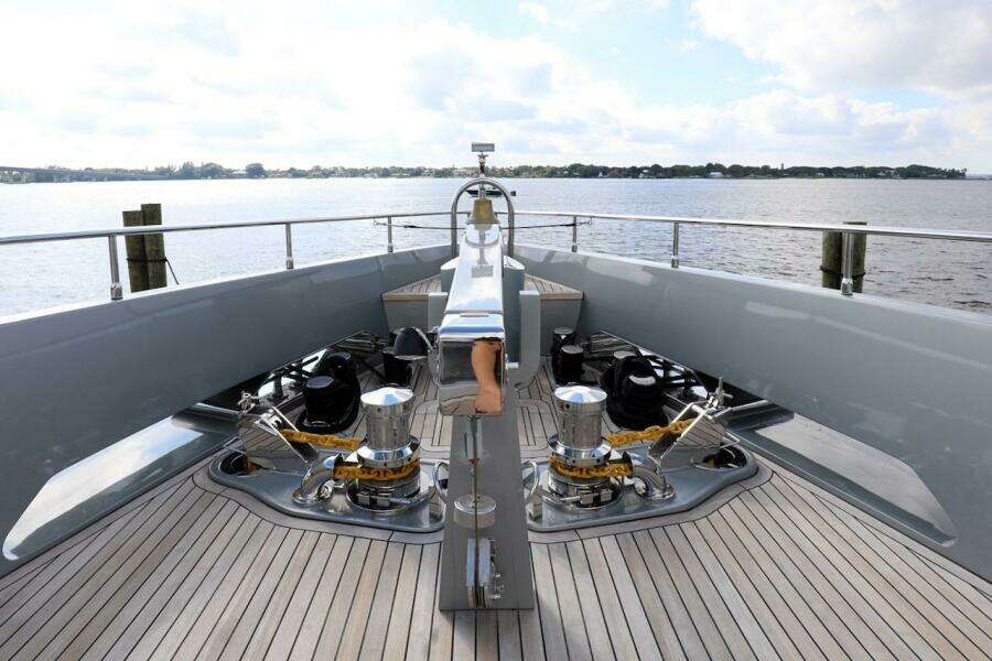 Bow of 2025 Majesty 120 yacht with winches and ocean view.