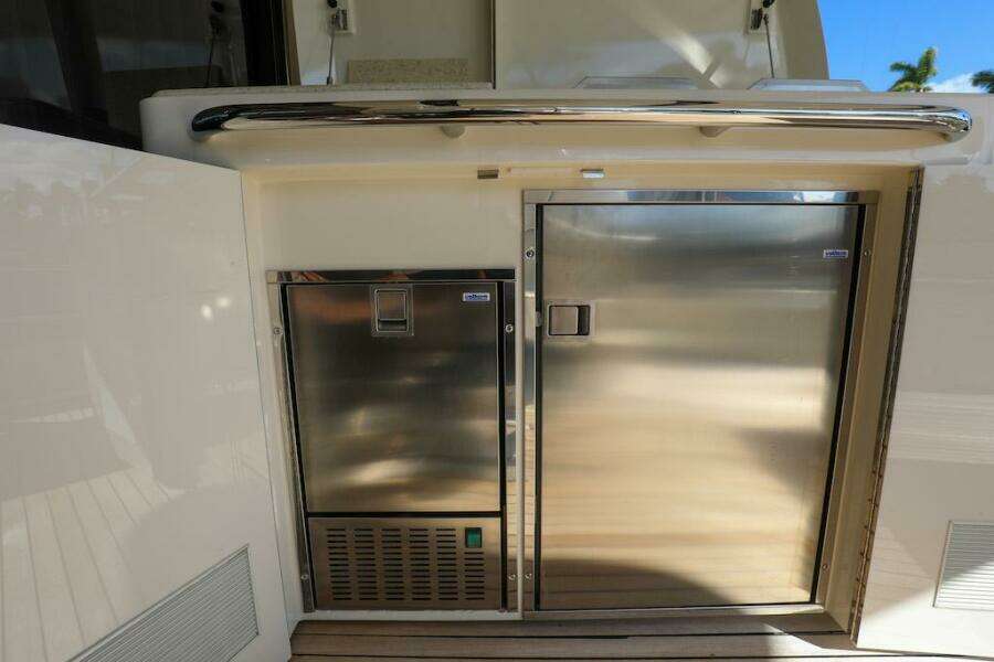 Stainless steel appliances on 2016 Marquis 660 Sport Yacht deck.